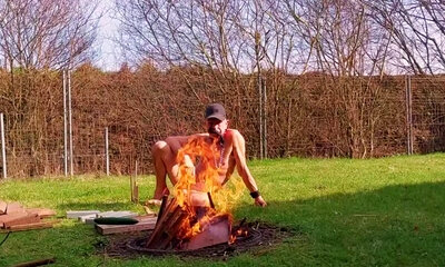 totally naked gay slave slut exposed in penis cage outdoor cucumber fuck at campfire BDSM